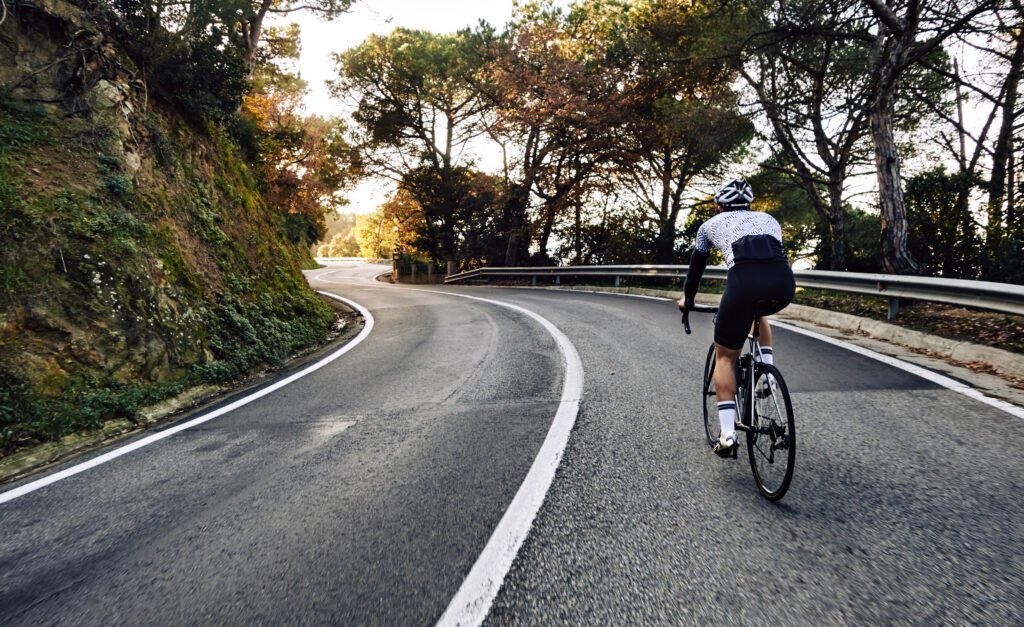 Cyclist riding on a dedicated cycling track in Islamabad