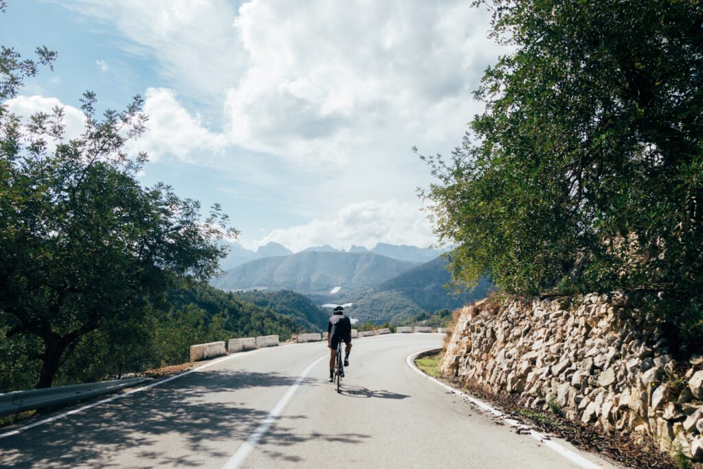 Cyclist riding on a dedicated cycling track in Islamabad