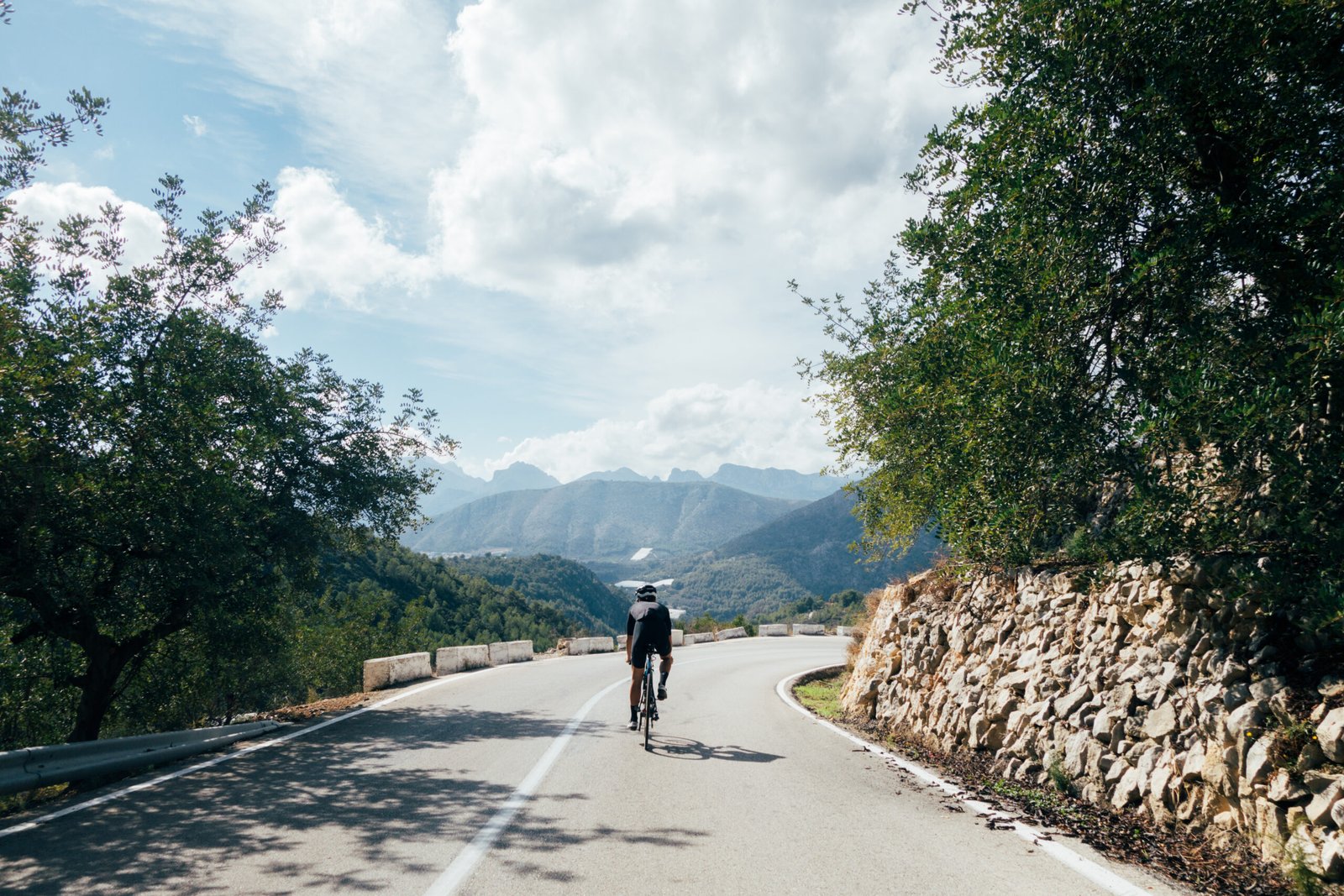 Cyclist riding on a dedicated cycling track in Islamabad